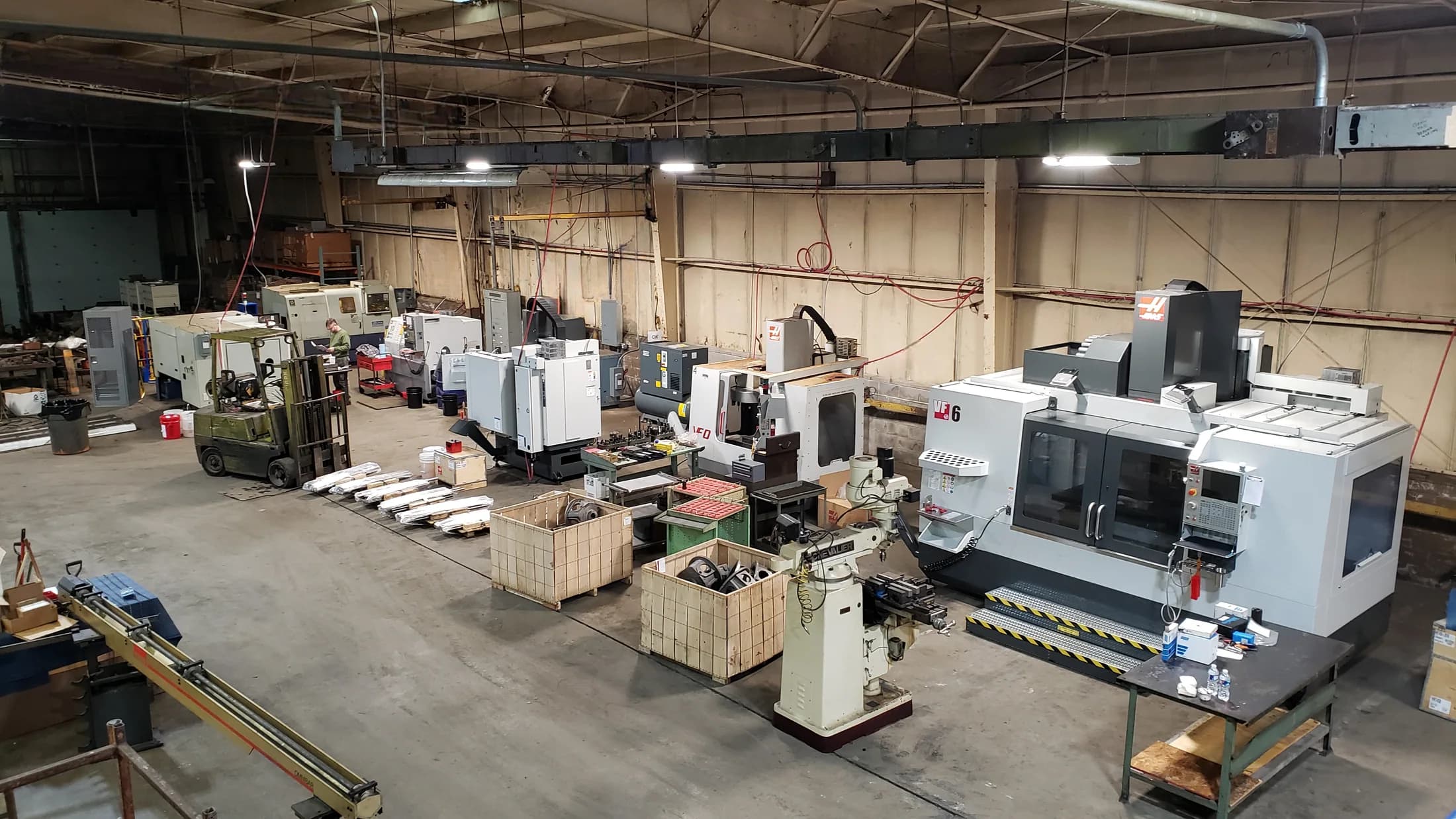 CNC vertical machining centers on the GMS Industries shop floor in Buchanan, Michigan