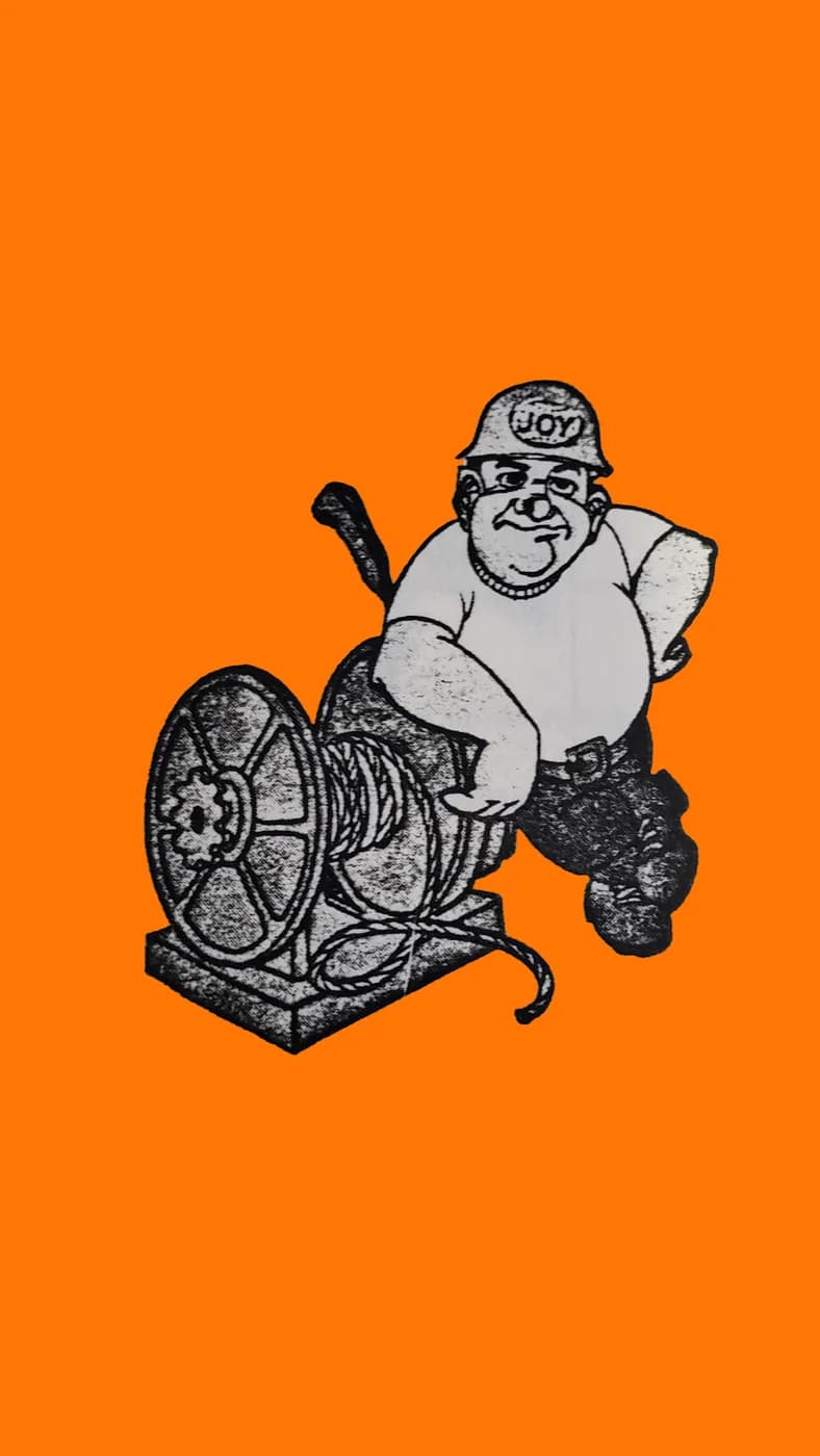 Vintage JOY illustration of a miner in a JOY hard hat leaning on a slusher winch